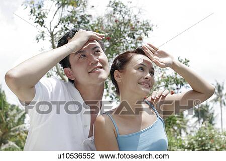 View of a young couple outing. View Large Photo Image Stock Image - View of a young couple outing.. Fotosearch