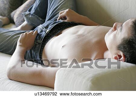 View of a young man sleeping. View Large Photo Image Stock Image - View of a young man sleeping.. Fotosearch