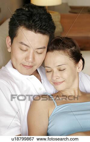 Young couple relaxing. View Large Photo Image Stock Photo - Young couple relaxing.. Fotosearch