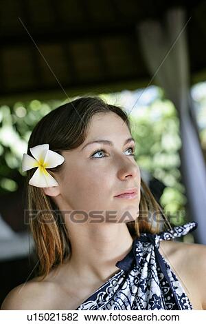 Close-up of a beautiful young woman. View Large Photo Image Stock Image - Close-up of a beautiful young woman.. Fotosearch
