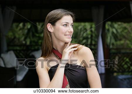 Close-up of a young woman. View Large Photo Image Picture - Close-up of a young woman.. Fotosearch