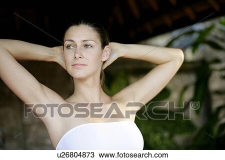 Stock Image - Close-up of a young woman.. Fotosearch