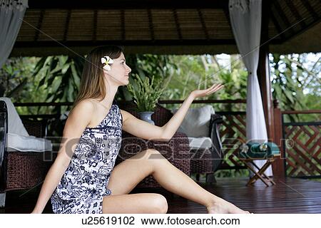 Side view of a beautiful young woman. View Large Photo Image Stock Image - Side view of a beautiful young woman.. Fotosearch