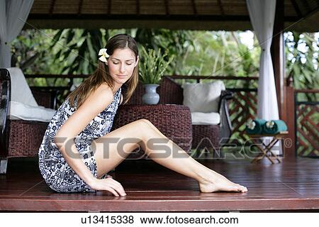 Side view of a beautiful young woman. View Large Photo Image Stock Photo - Side view of a beautiful young woman.. Fotosearch