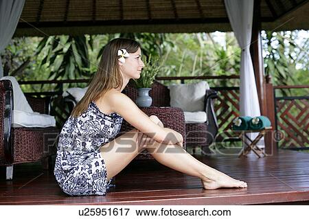 Side view of a beautiful young woman. View Large Photo Image Stock Photo - Side view of a beautiful young woman.. Fotosearch