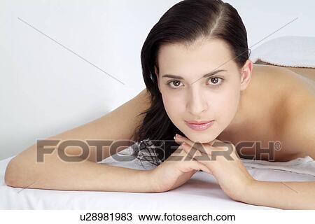 Stock Image - Close-up of a topless woman.. Fotosearch