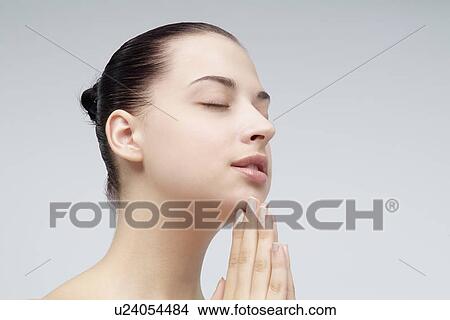 Close-up of a young woman. View Large Photo Image Picture - Close-up of a young woman.. Fotosearch