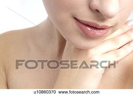 Stock Image - Close-up of a young woman.. Fotosearch