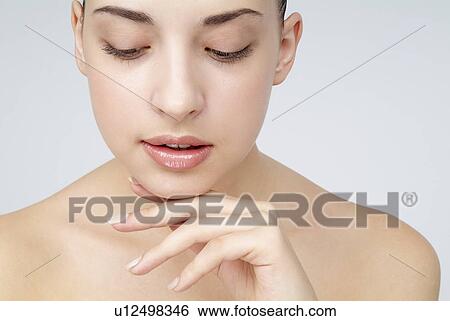 View of a woman looking down. View Large Photo Image Stock Photograph - View of a woman looking down.. Fotosearch
