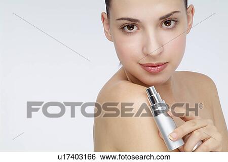 View of a woman with a lipstick. View Large Photo Image Stock Photograph - View of a woman with a lipstick.. Fotosearch