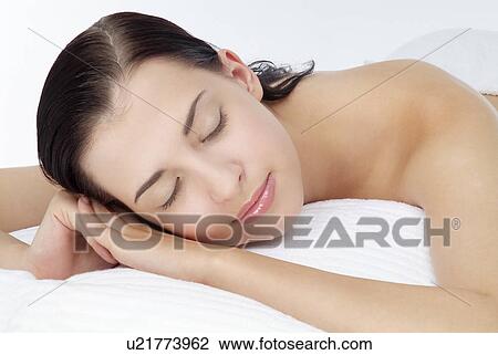 View of a young woman sleeping. View Large Photo Image Stock Image - View of a young woman sleeping.. Fotosearch