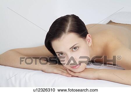 Close-up of a topless woman. View Large Photo Image Stock Image - Close-up of a topless woman.. Fotosearch