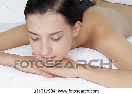 Picture - Close-up of a woman relaxing.. Fotosearch
