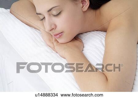Close-up of a woman relaxing. View Large Photo Image Picture - Close-up of a woman relaxing.. Fotosearch