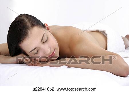 Stock Image - Close-up of a woman relaxing.. Fotosearch