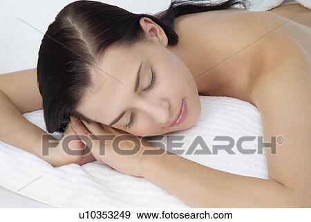 Stock Photo - Close-up of a woman relaxing.. Fotosearch