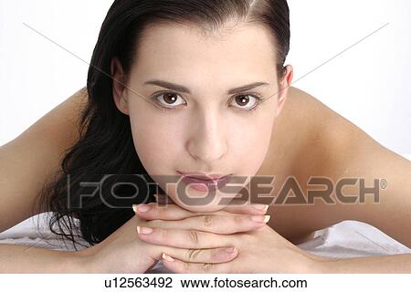 Stock Image - Close-up of a young woman.. Fotosearch