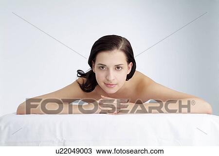 Stock Image - Close-up of a young woman.. Fotosearch