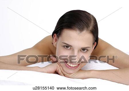 Stock Image - Close-up of a young woman.. Fotosearch