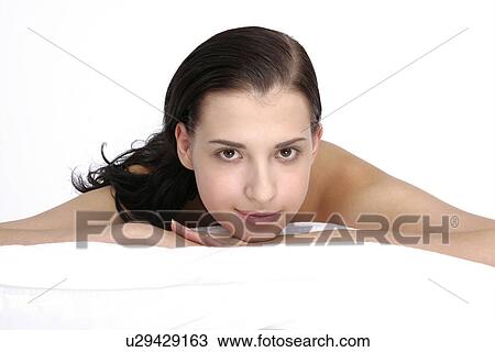 Stock Image - Close-up of a young woman.. Fotosearch