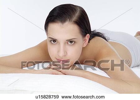 Stock Photo - View of a woman relaxing.. Fotosearch