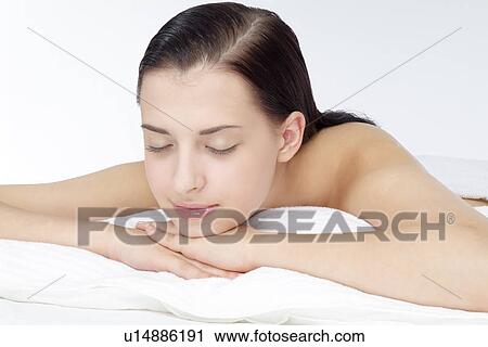 Stock Image - View of a woman sleeping.. Fotosearch