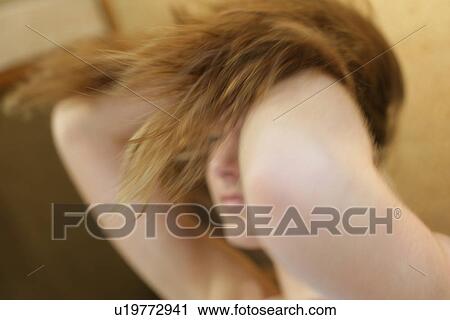 A woman handling her hair. View Large Photo Image Stock Image - A woman handling her hair.. Fotosearch