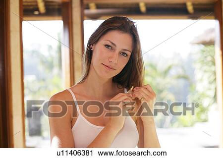 A woman holding perfume bottle. View Large Photo Image Stock Image - A woman holding perfume bottle.. Fotosearch