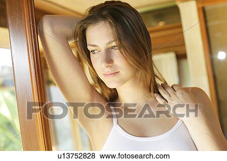 Stock Photo - A woman looking away.. Fotosearch