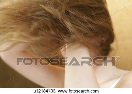 Stock Image - Close-up of a young woman.. Fotosearch