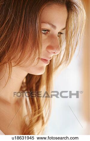 Stock Photography - View of a beautiful young woman.. Fotosearch