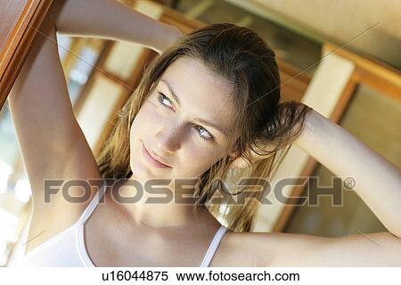 Stock Photography - View of a woman looking away.. Fotosearch