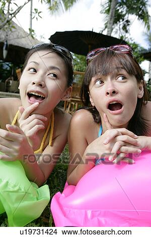 Close-up of two teenage girls. View Large Photo Image Picture - Close-up of two teenage girls.. Fotosearch