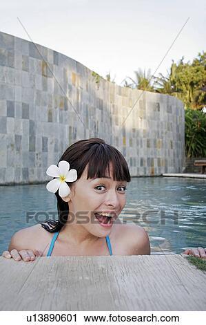 Portrait of a teenage girl in a swimming pool. View Large Photo Image Stock Image - Portrait of a teenage girl in a swimming pool.. Fotosearch