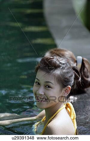 Portrait of a teenage girl in a swimming pool. View Large Photo Image Stock Photo - Portrait of a teenage girl in a swimming pool.. Fotosearch