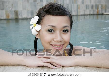Portrait of a teenage girl in swimming pool. View Large Photo Image Stock Photo - Portrait of a teenage girl in swimming pool.. Fotosearch