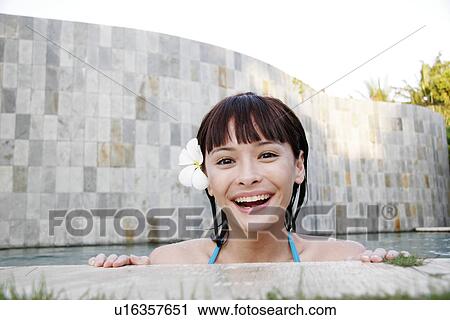 Portrait of a teenage girl leaning near swimming pool. View Large Photo Image Stock Image - Portrait of a teenage girl leaning near swimming pool.. Fotosearch