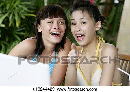 Portrait of two teenage girls smiling. View Large Photo Image Stock Photo - Portrait of two teenage girls smiling.. Fotosearch