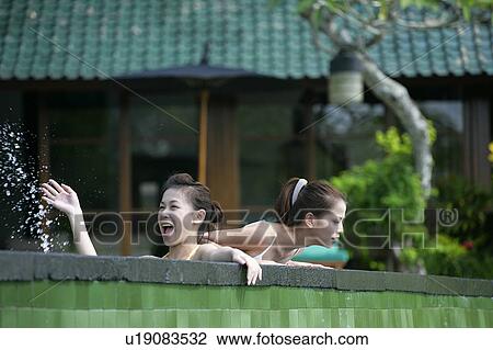 Two teenage girls near boundary wall. View Large Photo Image Stock Image - Two teenage girls near boundary wall.. Fotosearch