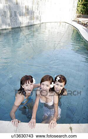 View of teenage girls in a swimming pool. View Large Photo Image Stock Image - View of teenage girls in a swimming pool.. Fotosearch