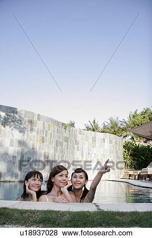 View of three teenage girls in a swimming pool. View Large Photo Image Stock Photo - View of three teenage girls in a swimming pool.. Fotosearch