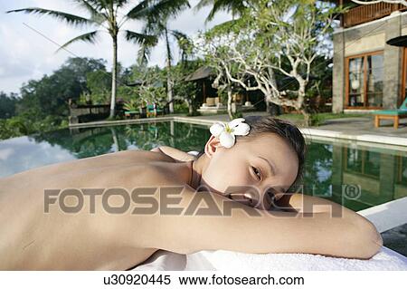 View of a seminude teenage girl lying. View Large Photo Image Stock Photography - View of a seminude teenage girl lying.. Fotosearch