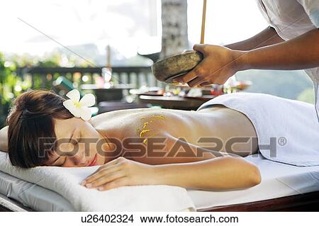 View of a teenage girl taking a spa treatment. View Large Photo Image Picture - View of a teenage girl taking a spa treatment.. Fotosearch