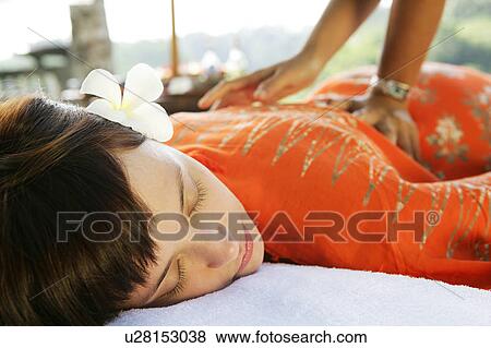 View of a teenage girl taking a spa treatment. View Large Photo Image Stock Photo - View of a teenage girl taking a spa treatment.. Fotosearch