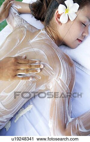 High angle view of cream applied on a teenage girl’s back. View Large Photo Image Stock Image - High angle view of cream applied on a teenage girl’s back.. Fotosearch