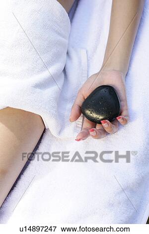View of a stone in a female’s hand. View Large Photo Image Stock Photo - View of a stone in a female’s hand.. Fotosearch
