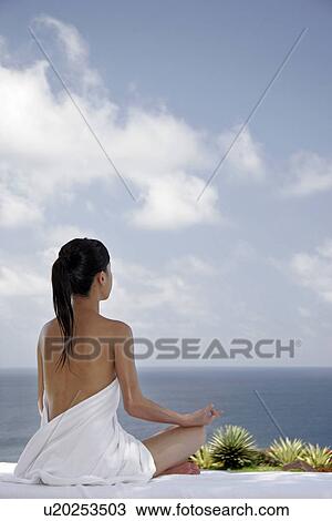 View of a teenage girl meditating. View Large Photo Image Stock Image - View of a teenage girl meditating.. Fotosearch