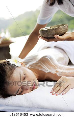 View of a teenage girl taking a massage. View Large Photo Image Stock Image - View of a teenage girl taking a massage.. Fotosearch