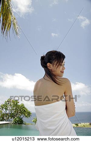 View of a teenage girl wrapped in a towel. View Large Photo Image Stock Image - View of a teenage girl wrapped in a towel.. Fotosearch