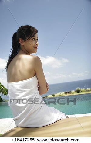 View of a teenage girl wrapped in a towel. View Large Photo Image Stock Photography - View of a teenage girl wrapped in a towel.. Fotosearch
